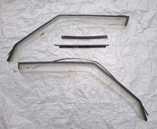 cornici + deflettore antiturbo alfa 75 destro e sinistro originali trasparente