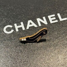 Spilla decolte con tacco