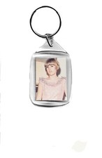 portachiavi recente caterina caselli cantante  (no 45 giri lp 33 cd dvd book)