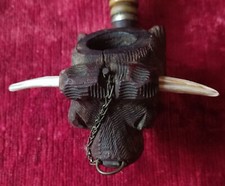 Antica pipa a testa di toro