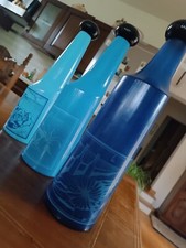 N. 3 BOTTIGLIE DA LIQUORE VINTAGE - DESIGN DI SALVADOR DALI'  PER ROSSO ANTICO-