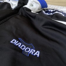 Giacca vintage Diadora Track Snap On rimovibile maniche lunghe nero blu zip davanti