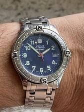 Orologio militare vintage Wenger Swiss Made lunetta a bussola acciaio inox doppia chiusura