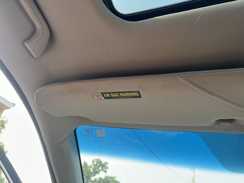 Gray driver sun visor - driver's,