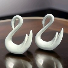 Coppia di cigni in ceramica