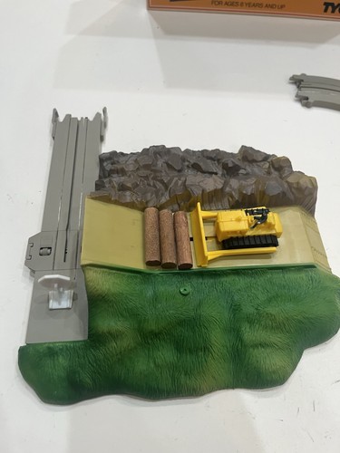 Bulldozer carico tronchi