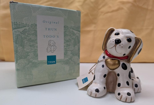 Thun sitting dalmation cane - sitting,