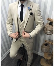 Abito beige, con gilet