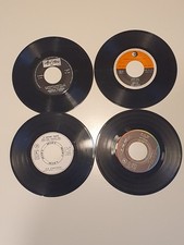 Lotto 4 dischi vinile 45 giri