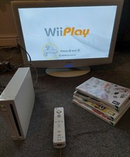 Pacchetto Console Nintendo Wii Bianca Testata - 4 Giochi Ufficiale Family Fun Wii Play
