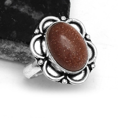 Anello etnico fatto - a, con