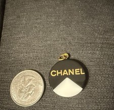 Charm Chanel con cerniera