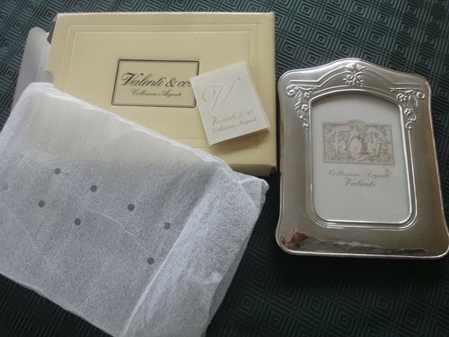 Cornice valenti argento - in,