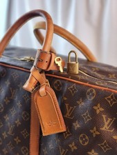 Autentica borsa da viaggio Louis Vuitton Sirius 55 marrone monogramma LV lock tag Poignet