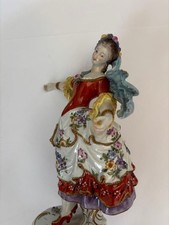 Antica statuina bambola