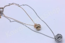 COLLANA CHIAMA ANGELI CON DOPPIO SONAGLIO FORMA SFERA COLOR ARGENTO E ORO ROSA