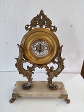 Orologio antico in metallo con base in marmo, antiquariato