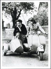 Foto vintage Vespa con sidecar