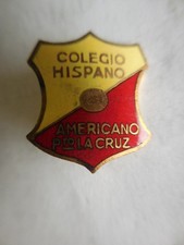 Distintivo college ispanico americano La Cruz