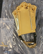 Coda a trapezio oro per