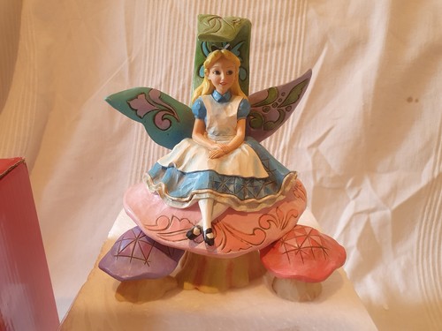 Disney traditions alice on - traditions,