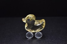 Statuina gialla in cristallo