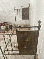 Antico letto in ferro battuto
