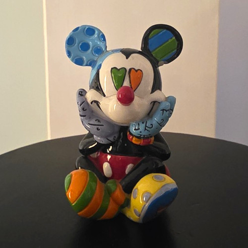 Disney romero britto sitting - romero,