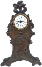 Antico orologio da tavolo in antimonio bronzato d'epoca e stile Liberty