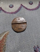 Gettone telefonico 7707 - gettone,