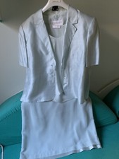 tailleur elegante donna con gonna, giacca e top