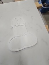 Tagliere a forma di pene in