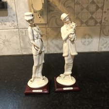 Coppia di sculture in