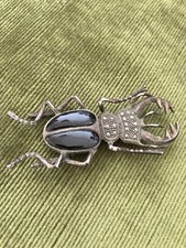 Spilla Anni 20 “Cervo Volante”In Argento Onice e Zaffiri Neri