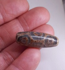 dzi tibetano pietra dura porta fortuna in agata naturale nove occhi collezione