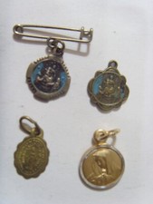 Lotto 4 ciondoli religiosi