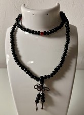 Collana di perle in legno