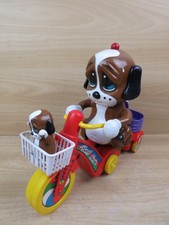 vecchio GIOCATTOLO PUPPY NURSE cane in bicicletta vintage triciclo cestino