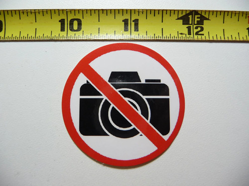Non ammesse fotocamera - no,