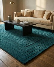 Tappeto trapuntato a mano