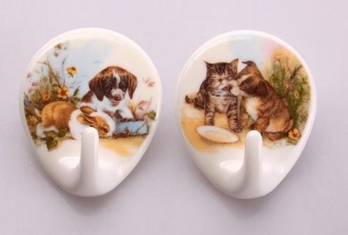 Ganci adesivi porcellana - in,
