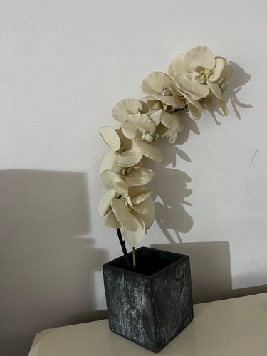 Orchidea artificiale compresa