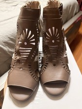 Sandalo donna gladiatore tacco