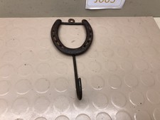 Reale? Gancio da parete a