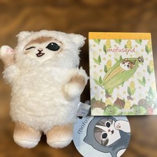 Peluche gatto ammiccante