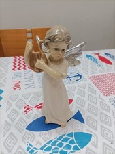 ANGELO MUSICANTE CON ARPA