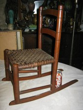 ANTICA SEDIA A DONDOLO BAMBINO