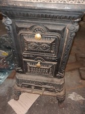 STUFA IN GHISA ANTICA STUFA IN