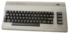 Commodore 64 C64 VIDEOGIOCO GIOCO CONSOLE VINTAGE RAR SOLO BISCOTTONE