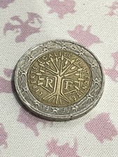 Moneta 2€ Francia 1999 con errore di conio (due stelle in parte tagliate)